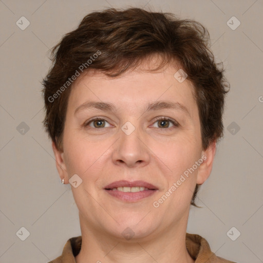 Joyful white adult female with short  brown hair and brown eyes