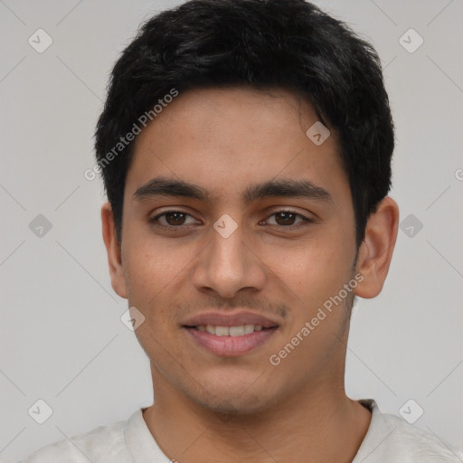 Joyful latino young-adult male with short  black hair and brown eyes