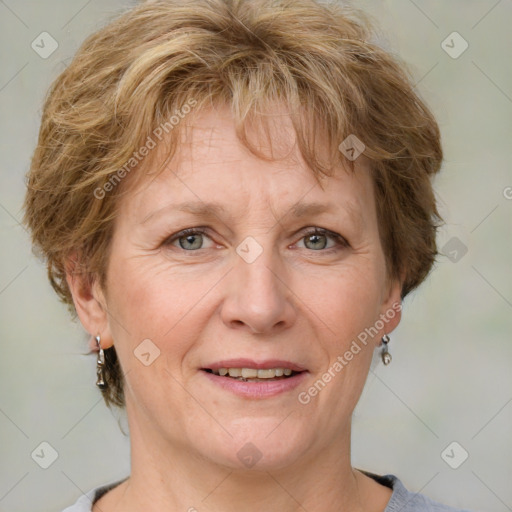 Joyful white adult female with short  brown hair and grey eyes