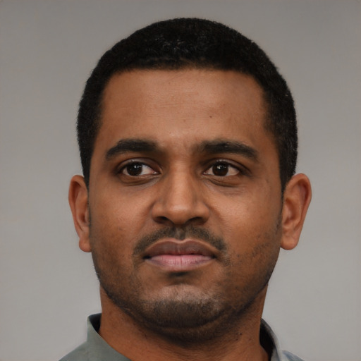 Neutral black young-adult male with short  black hair and brown eyes