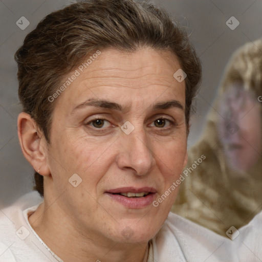 Joyful white adult female with short  brown hair and brown eyes