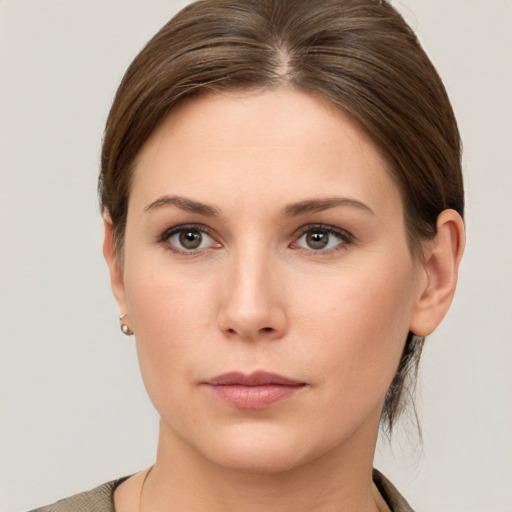 Neutral white young-adult female with short  brown hair and brown eyes