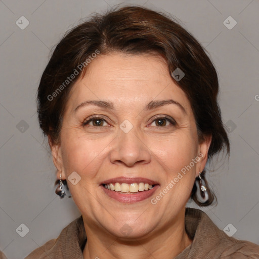 Joyful white adult female with medium  brown hair and brown eyes