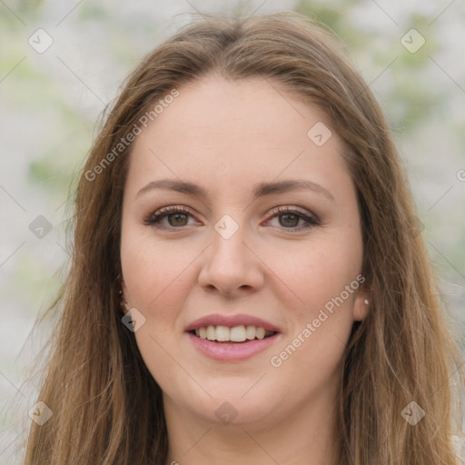 Joyful white young-adult female with long  brown hair and green eyes