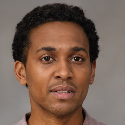 Neutral black young-adult male with short  brown hair and brown eyes