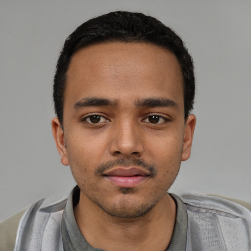 Neutral latino young-adult male with short  black hair and brown eyes