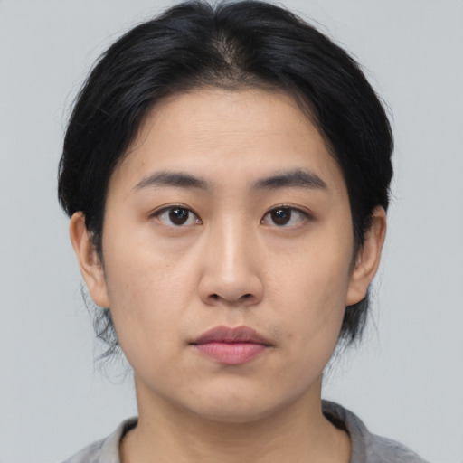 Neutral asian young-adult male with medium  black hair and brown eyes
