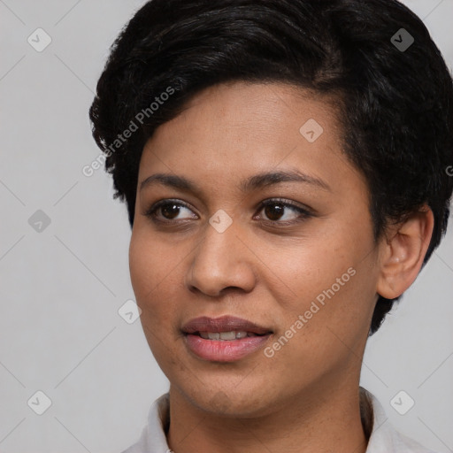 Joyful asian young-adult female with short  black hair and brown eyes