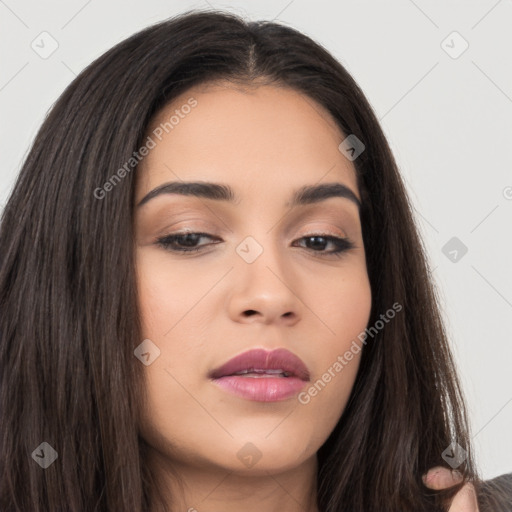 Joyful asian young-adult female with long  brown hair and brown eyes