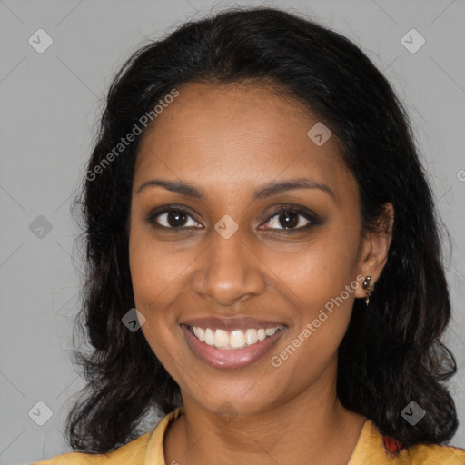 Joyful black young-adult female with long  brown hair and brown eyes