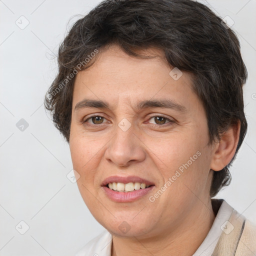 Joyful white adult female with short  brown hair and brown eyes