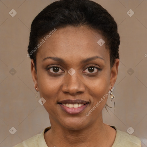 Joyful black young-adult female with short  black hair and brown eyes
