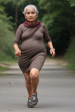 Nepalese elderly female with  brown hair