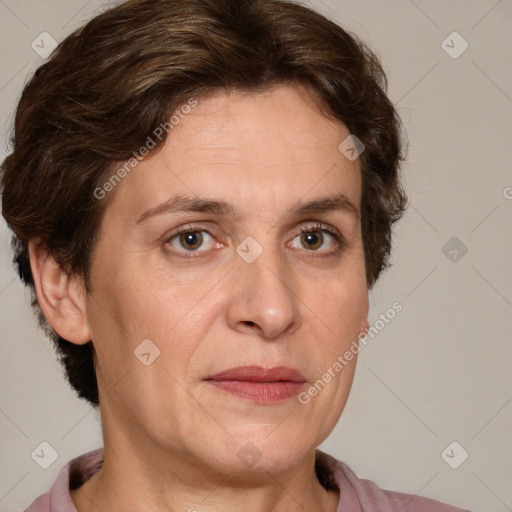 Joyful white adult female with short  brown hair and brown eyes