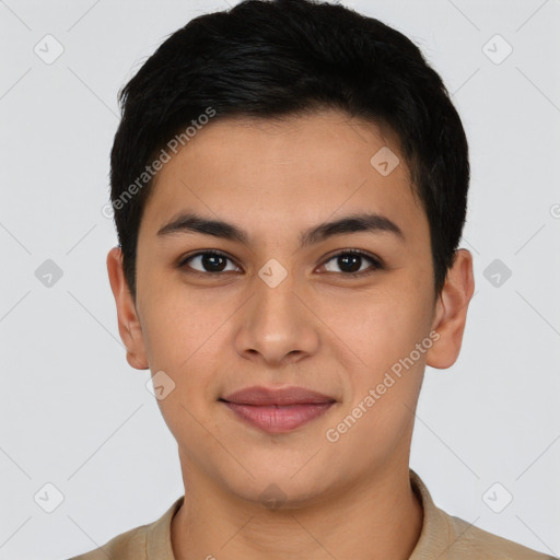 Joyful latino young-adult male with short  brown hair and brown eyes