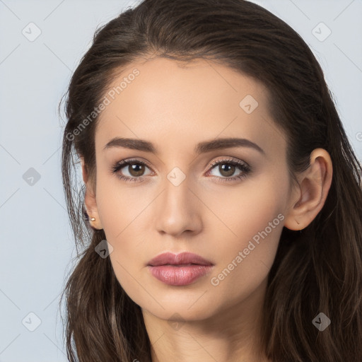 Neutral white young-adult female with long  brown hair and brown eyes