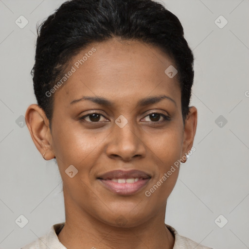 Joyful black young-adult female with short  brown hair and brown eyes