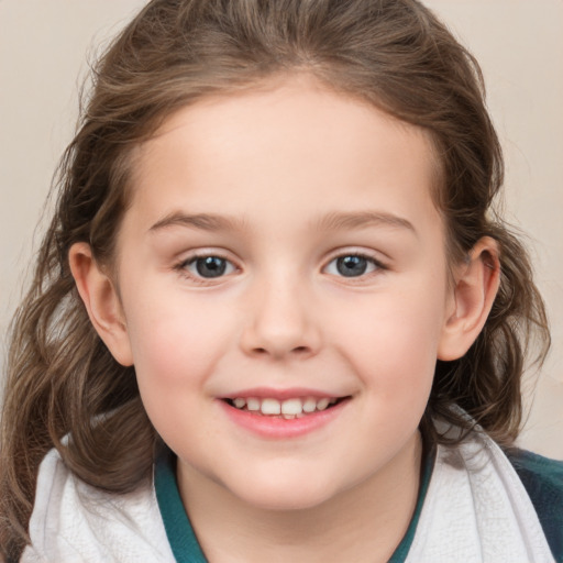 Joyful white child female with medium  brown hair and grey eyes