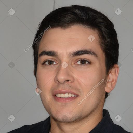 Joyful white young-adult male with short  black hair and brown eyes