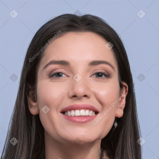 Joyful white young-adult female with long  black hair and brown eyes