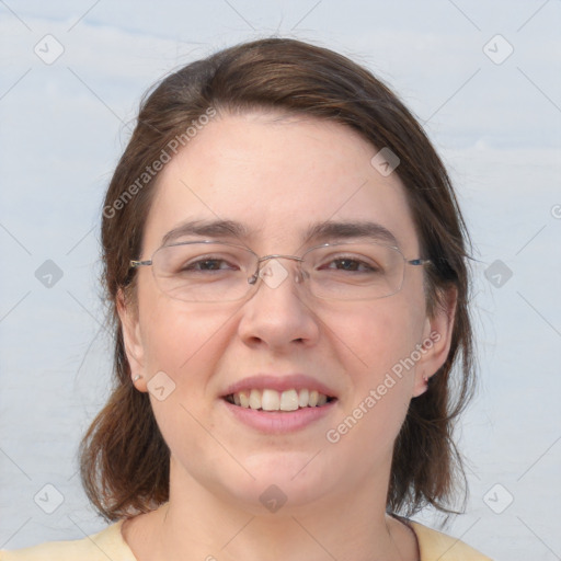 Joyful white adult female with medium  brown hair and grey eyes