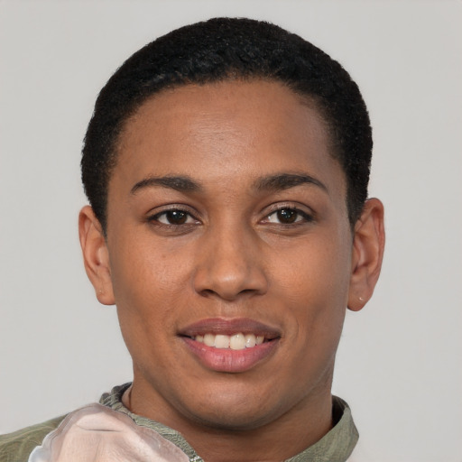 Joyful latino young-adult female with short  black hair and brown eyes