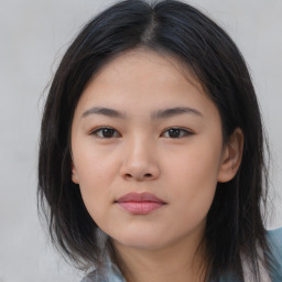 Neutral asian young-adult female with medium  brown hair and brown eyes