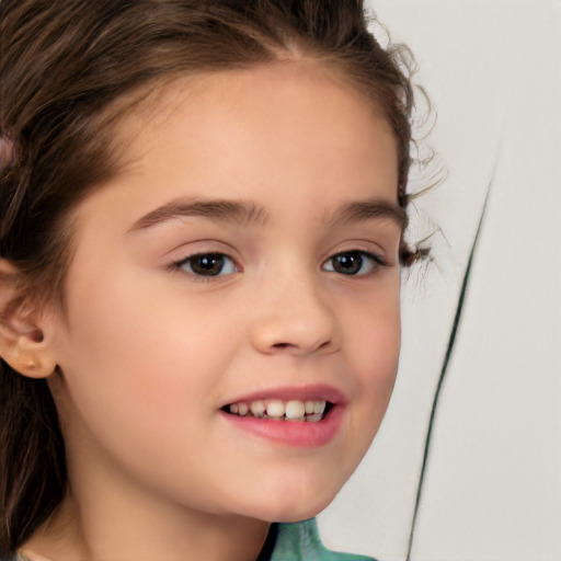 Joyful white child female with medium  brown hair and brown eyes