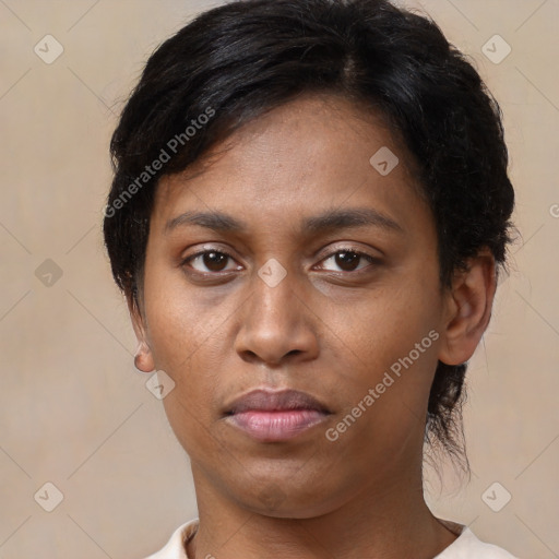 Neutral white young-adult female with short  brown hair and brown eyes