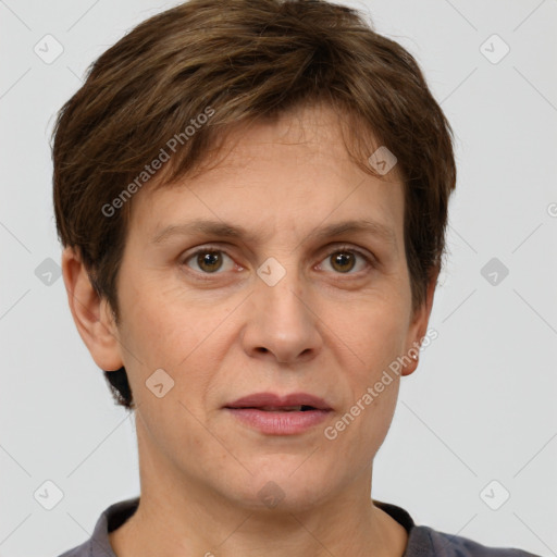 Joyful white adult female with short  brown hair and grey eyes