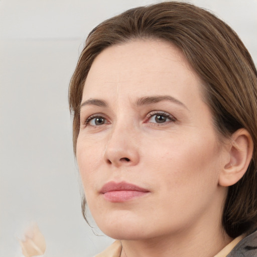 Neutral white young-adult female with medium  brown hair and grey eyes