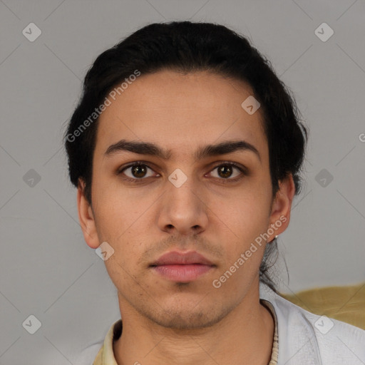 Neutral latino young-adult male with short  black hair and brown eyes