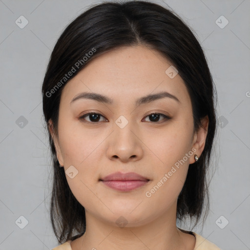 Joyful asian young-adult female with medium  brown hair and brown eyes