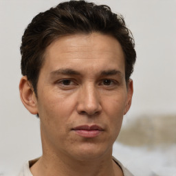 Neutral white adult male with short  brown hair and brown eyes