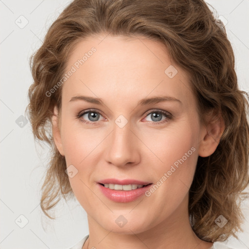 Joyful white young-adult female with medium  brown hair and green eyes