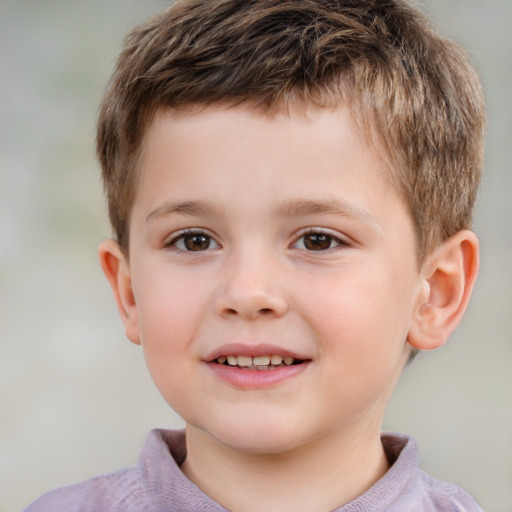 Joyful white child male with short  brown hair and brown eyes