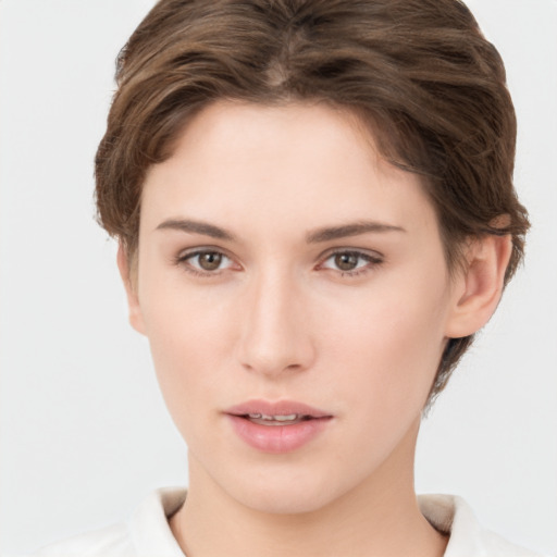 Neutral white young-adult female with short  brown hair and brown eyes