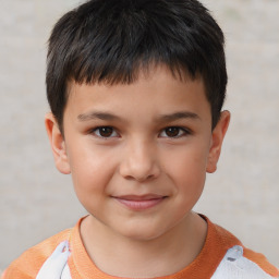 Joyful white child male with short  brown hair and brown eyes