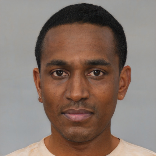 Neutral black young-adult male with short  black hair and brown eyes