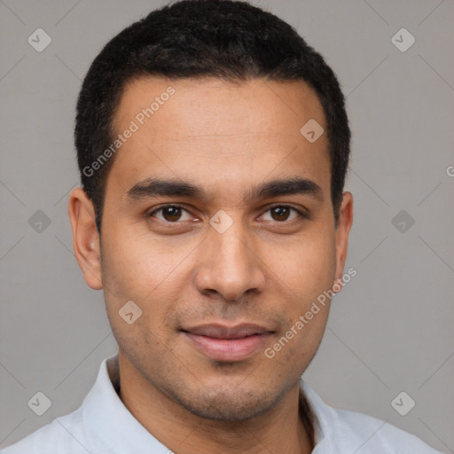 Joyful latino young-adult male with short  black hair and brown eyes