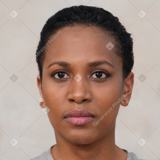 Neutral black young-adult female with short  black hair and brown eyes