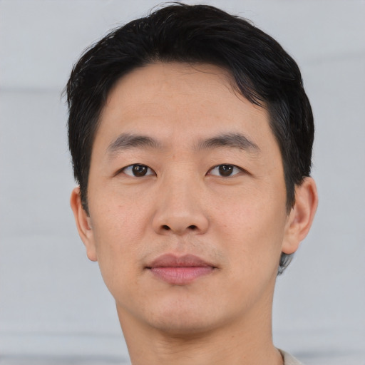 Neutral asian young-adult male with short  black hair and brown eyes
