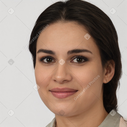 Joyful white young-adult female with medium  brown hair and brown eyes