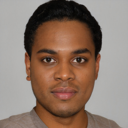 Neutral black young-adult male with short  black hair and brown eyes