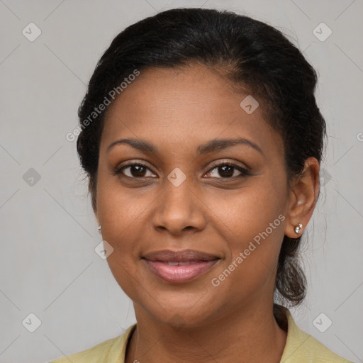 Joyful black young-adult female with medium  brown hair and brown eyes