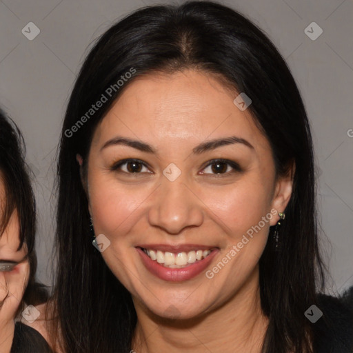 Joyful latino young-adult female with medium  brown hair and brown eyes