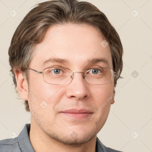 Joyful white adult male with short  brown hair and grey eyes