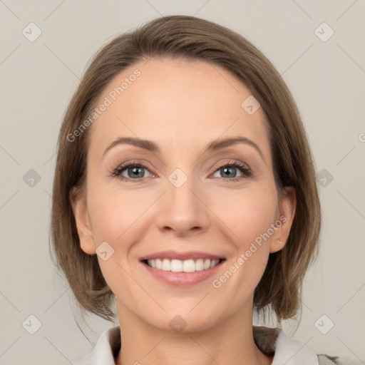 Joyful white young-adult female with medium  brown hair and grey eyes