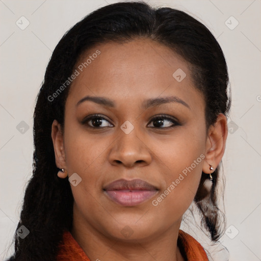Joyful latino young-adult female with medium  brown hair and brown eyes