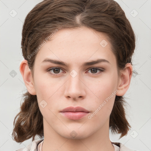 Neutral white young-adult female with medium  brown hair and grey eyes